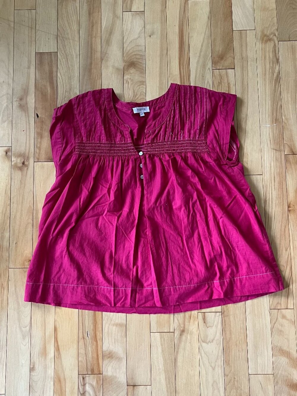 Hot pink babydoll-style blouse